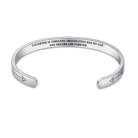"Laughter is timeless. Imagination has no age. And dreams are forever." Bracelet